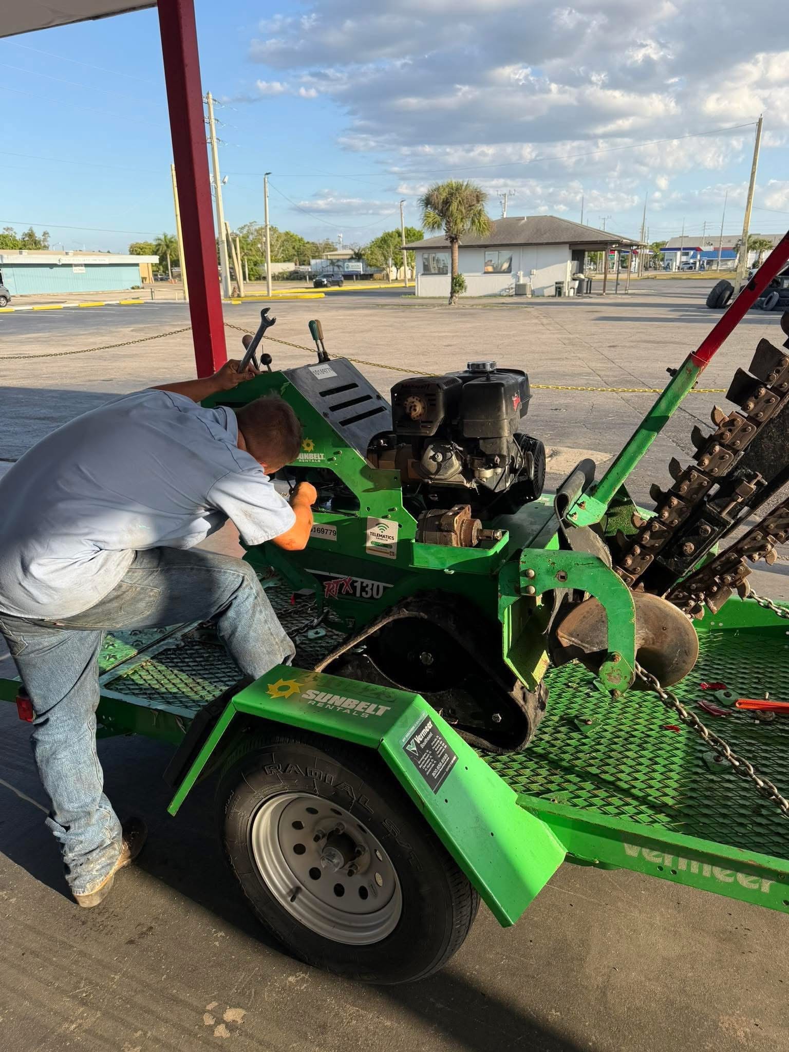 Wayne Godwin, founder of Mechanic First, working on equipment